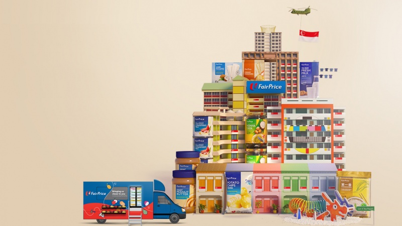Blocks of colourful HDB flats with FairPrice Housebrand products set amongst them, and a FairPrice on Wheels truck in the foreground
